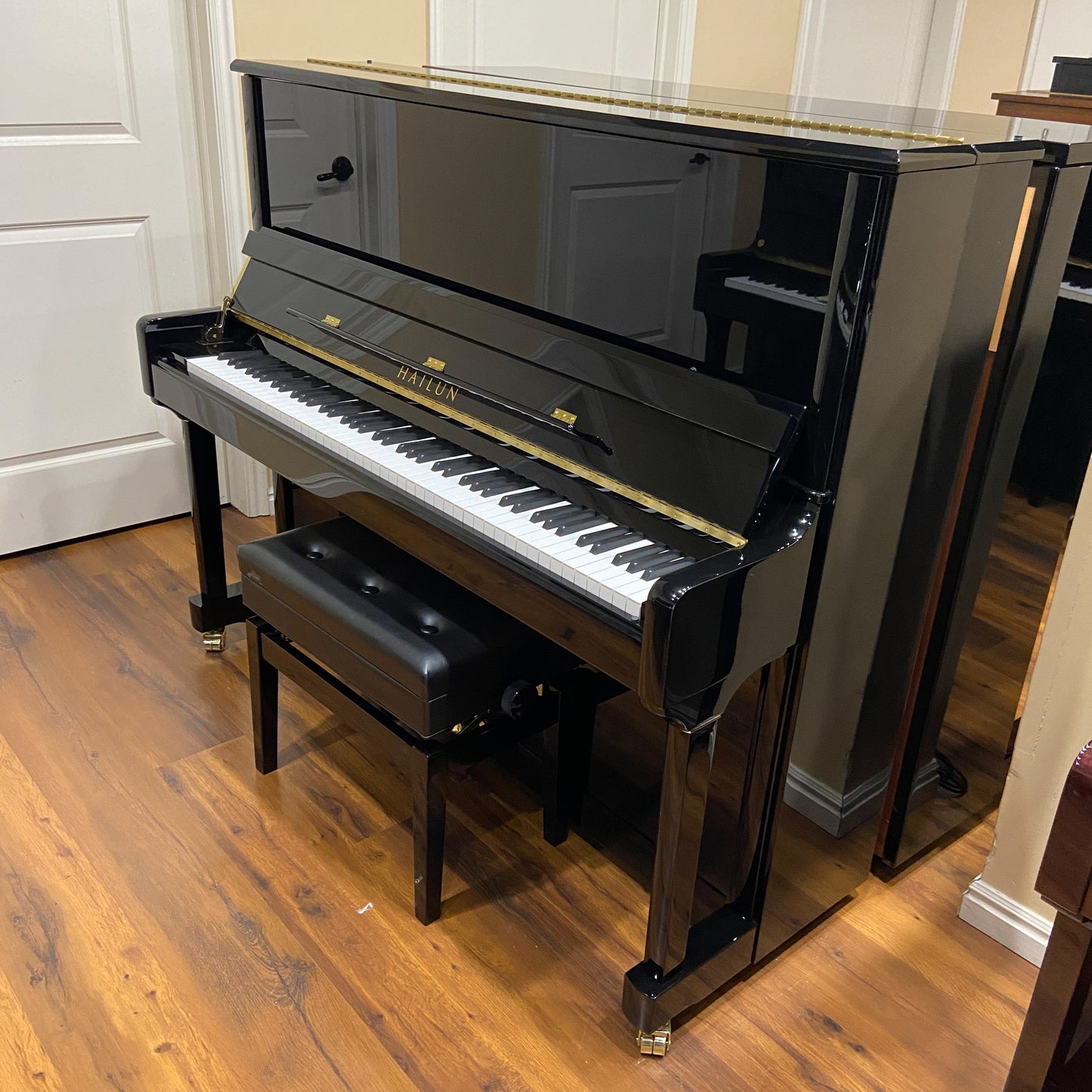 SOLD Hailun 5P 50" Polished Black Upright Piano