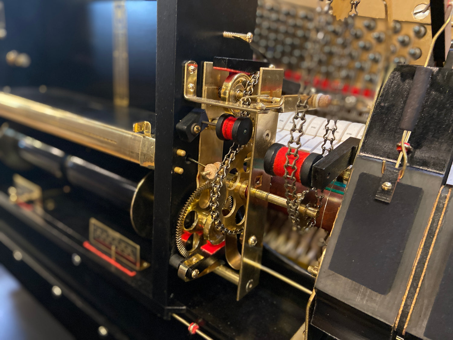Beautiful vintage piano player after restoration and rebuilding to full function on 100 year old Conway heirloom piano at Brigham Larson Pianos.