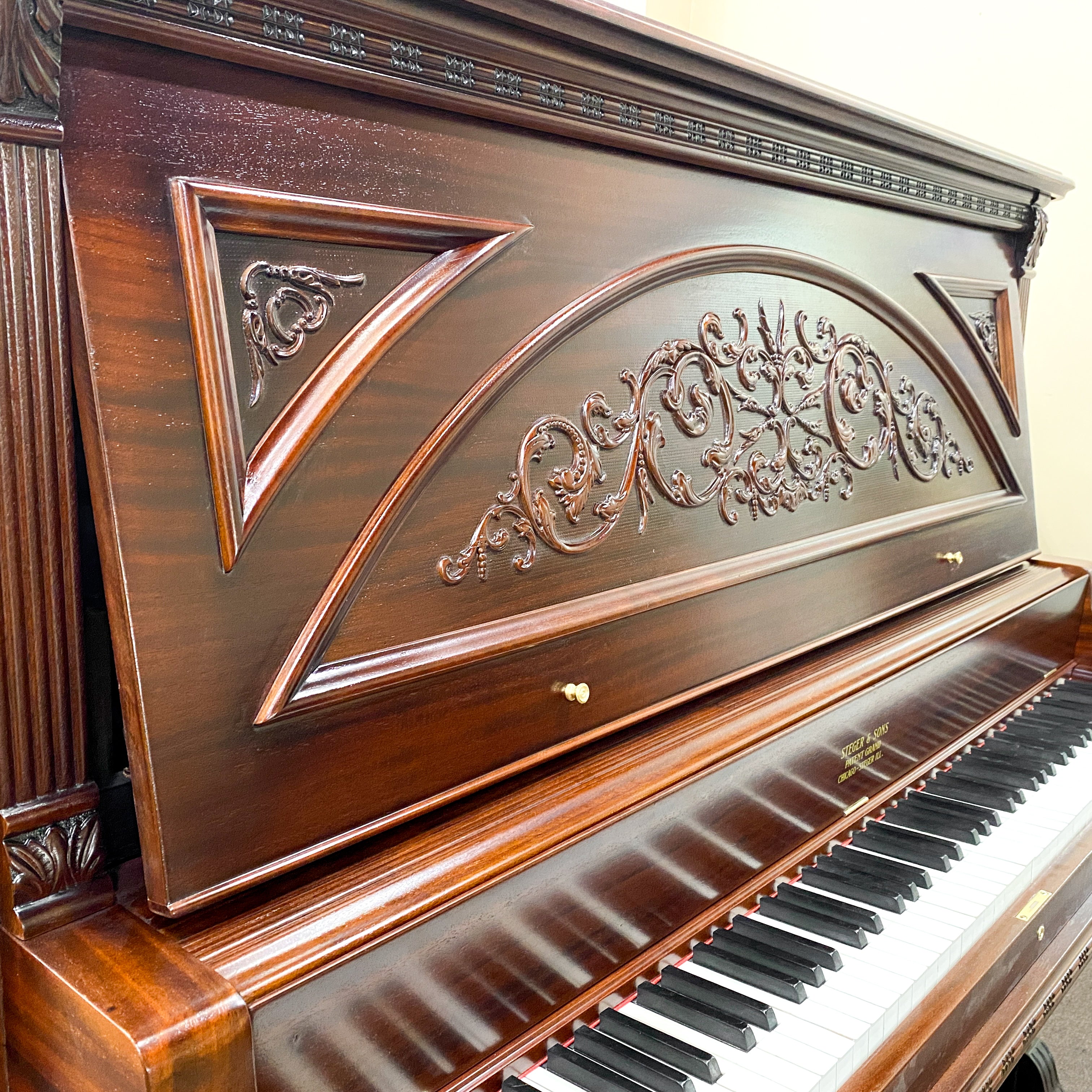 After piano restoration ornate cabinetry refinishing for Fully restored, rebuilt, refinished, like new restored sentimental family heirloom Steger upright piano. Gorgeous piano refinishing work! Ornate cabinetry. 